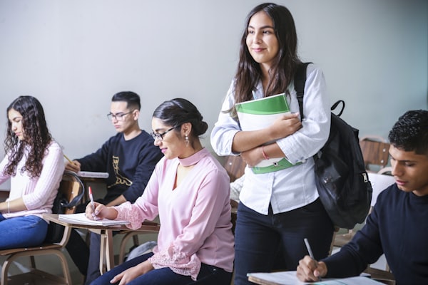 Students taking notes in class